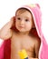 Astonished baby in towel