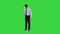 Astonished young businessman wearing VR glasses Concept of the future technology on a Green Screen, Chroma Key.