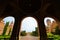 Astonishing landscape view of front yard with green trees and bushes of Chernivtsi University against sky.