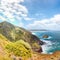 Astonishing spring view of Nebida and Fontanamare coastline with Scoglio il Morto and turquoise sea