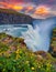 Astonishing summer view of Gullfoss - popular tourist destination. Gorgeous sunrise on Hvita river.