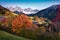 Astonishing view of Santa Magdalena village hills in front of the Geisler or Odle Dolomites Group. Colorful autumn scene of Dolomi