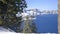 Astonishing view of snowy mountain range and lake under blue sky