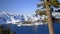 Astonishing view of snowy mountain range and lake under blue sky Crater Lake in Oregon