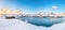 Astonishing winter view on Hamnoy village with port and snowy  mountain peaks  on background