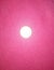 It is an astrology sign astronomy pink colour illuminated Circle Architecture built structure close up sky in Patna India