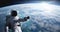Astronaut conducting spacewalk on Earth orbit