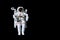 Astronaut with a jetpack isolated on black background with copy space