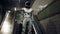 An astronaut with a laptop in the subway hurries to his spaceship. The image is for fantastic, the futuristic or space