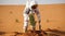 Astronaut Plants a Tree on the Red Planet Mars. Generative AI