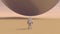 Astronaut Space Explorer and Large Alien Silver Orb Sphere Floating above a Hard Desert