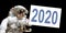 Astronaut in space holding a 2020 white  board - New year greeting card