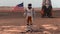 Astronaut walking on Mars with American flag. Exploring Mission To Mars Red Planet. Futuristic Colonization Space