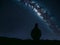 Astronomer gazing at the night sky filled with stars and galaxies. AI Generated