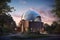 astronomical observatory dome opening to reveal telescope