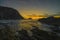 Asturias, sunset on the beach of Gueirua in the Cantabrian Sea