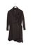Asymmetrical model of female garment, asymmetric black dress, cotton tunic on white background, isolated wraparound gown