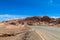 Atacama desert arid landscape and asphalt road