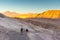 Atacama Desert - Out 9th 2017 - Tourists walking through the dunes of the Moon Valle Vale de la Luna in the late afternoon, suns