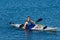 Atheltic man in a sea kayak