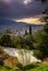 Athens cityscape  from Acropolis slope, sunset / sunrise time. Colorful cloudy sky