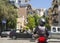 Athens, Greece. August 2019: a Motorcyclist in gear and helmet stopped at a traffic light on a street in the center of the Greek c