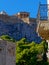 Athens Greece, Erechtheion temple on acropilis hill over roman winds tower, and a neoclassical balcony