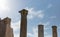 Athens Greece. Hadrians library columns, blue sky background, sunny day, Monastiraki area