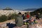 Athens, Greece, January 30 2018: People enjoy the view to the city of Athens from the hill of Areopagus