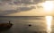 Athens / Greece: A lonely man watching the sunset on the coast near Athens, Greece