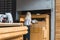 ATHENS, GREECE - SEPTEMBER 17, 2018: View of a waitress waiting for food getting ready