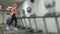 Athlete blonde engaged in the gym