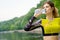 Athlete caucasian woman in sportswear drinking water