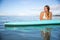 Athlete chilling on her paddle board in Hawaii