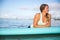 Athlete chilling on her paddle board in Hawaii