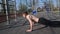 Athlete does push-ups on an outdoor playground