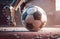 Athlete foot kicking soccer ball on a pitch, for Sport concept. Generative AI