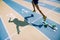 Athlete in Gold Shoes Sprinting Across Starting Line