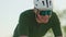 Athlete in helmet enjoying recreational cycle in open air