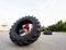 Athlete Lifting Large Tractor Tire