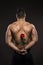 Athlete Man Back Rear view, Athletic Boy hide Rose Flower, Muscular Naked Body