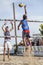 Athlete man beach volleyball jumping spike attack. Defense.