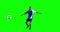 Athlete practicing soccer against green screen
