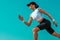 Athlete runner and sprinter. Girl fit athlete running on the sky background. The concept of a healthy lifestyle and