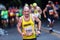 Athlete runs marathon, tired man, middle-aged