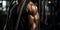 Athlete sculpting triceps with focused rope workout in the gym