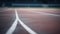 Athlete sprints on striped track towards success generated by AI