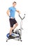 Athlete standing on a cross trainer machine