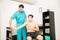 Athlete Suffering From Shoulder Pain Undergoing Physical Therapy