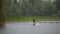 Athlete wakeboarder floats on water